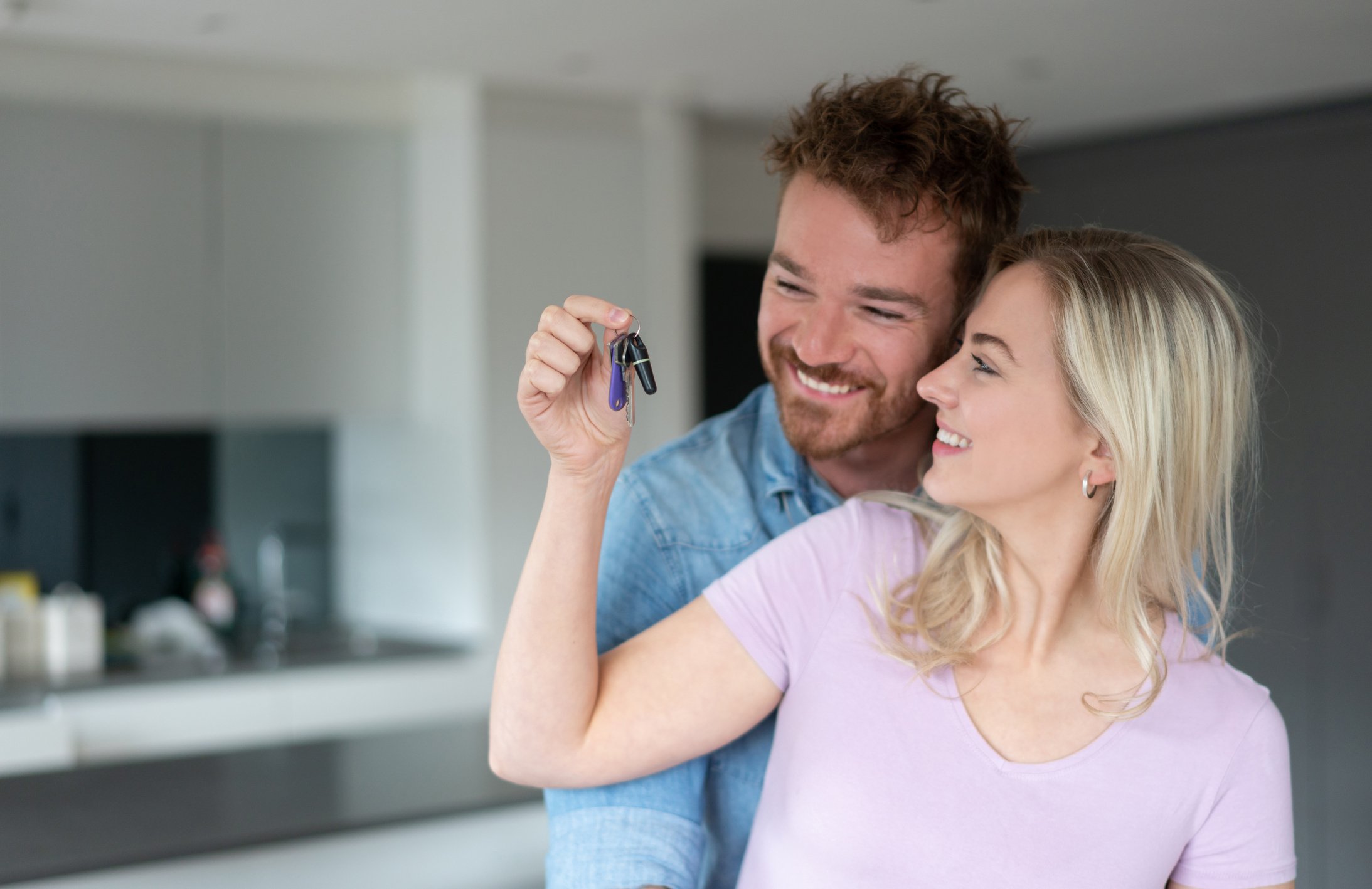 Loving couple buying a house