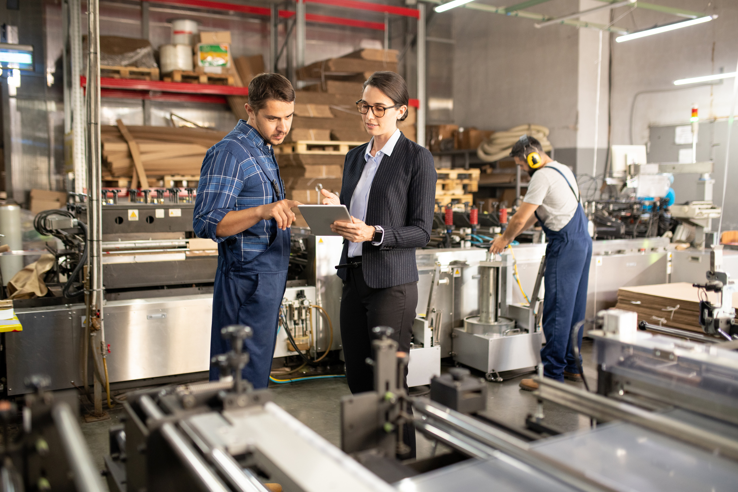 Workers of Processing Factory in a Discussion